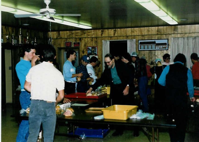 Making ham & cheese sandwiches for the ambulance's annual fundraiser... 2/90